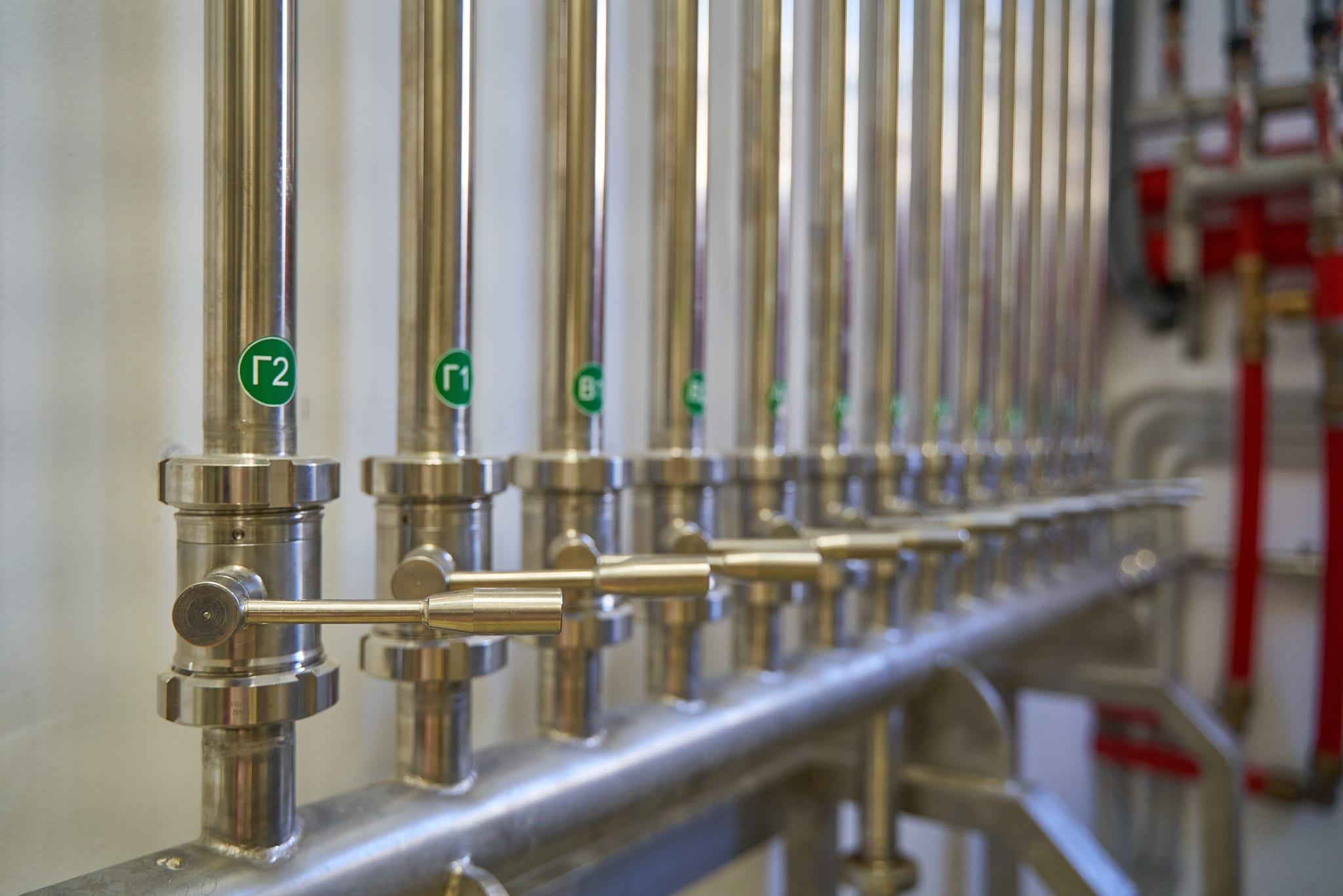 The valves of the stainless-steel storage tanks