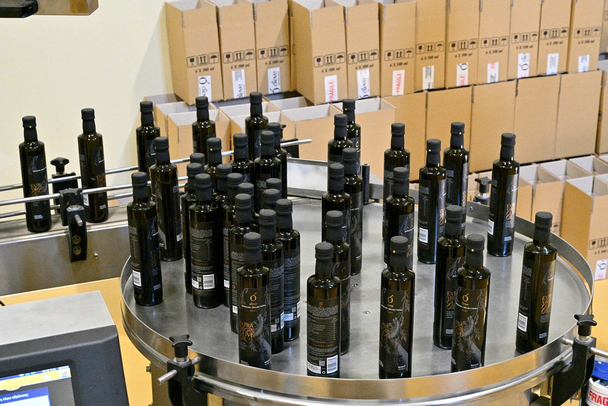 Dark glass bottles on the bottling line